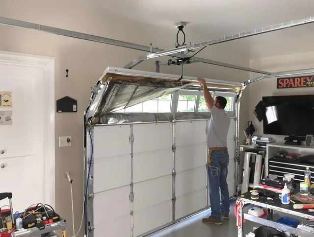 Garage door section replacement by Perris Garage Door Repair in Perris