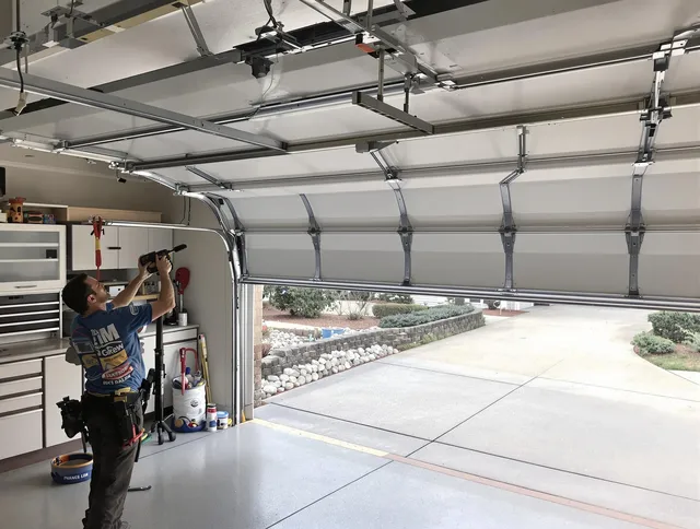 Garage door track repair service by Perris Garage Door Repair in Perris